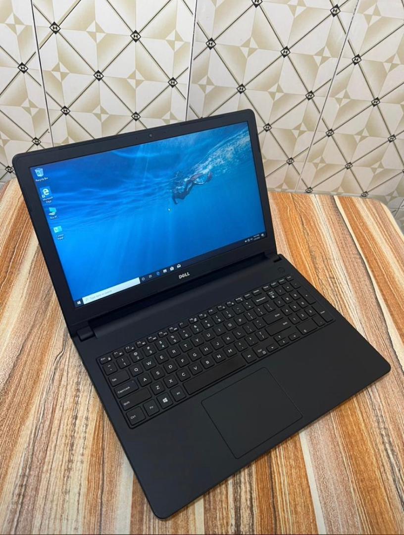 Black Dell laptop available from SharpSharp